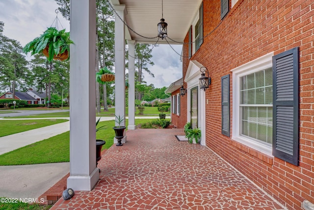 view of patio featuring a porch