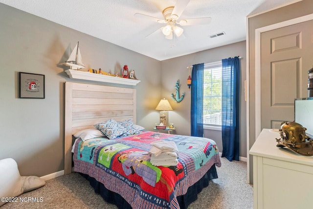 bedroom featuring ceiling fan and light colored carpet