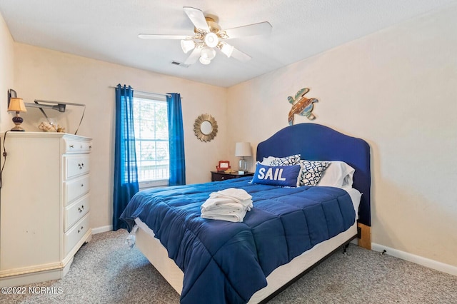 bedroom with light carpet and ceiling fan