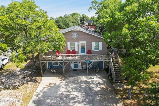 view of front of house with a deck