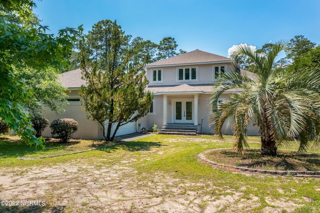 view of front of home with a front yard