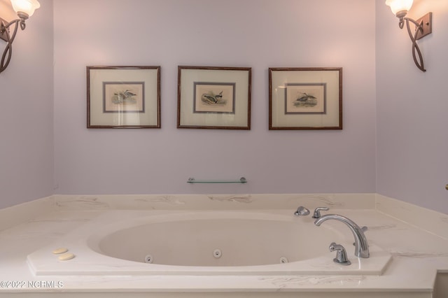 bathroom featuring a washtub