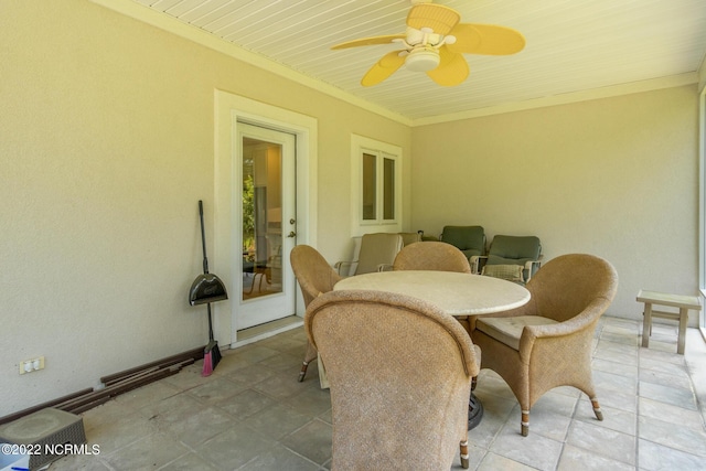 interior space featuring ceiling fan