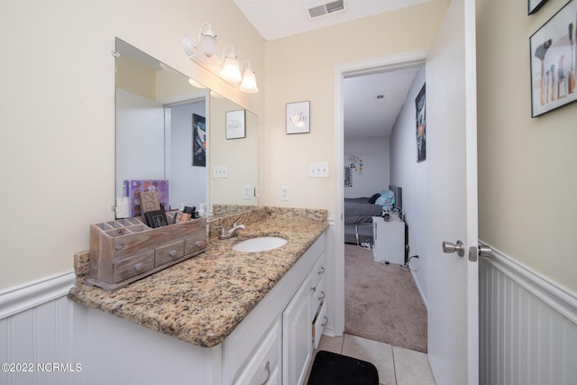 bathroom with tile flooring and oversized vanity