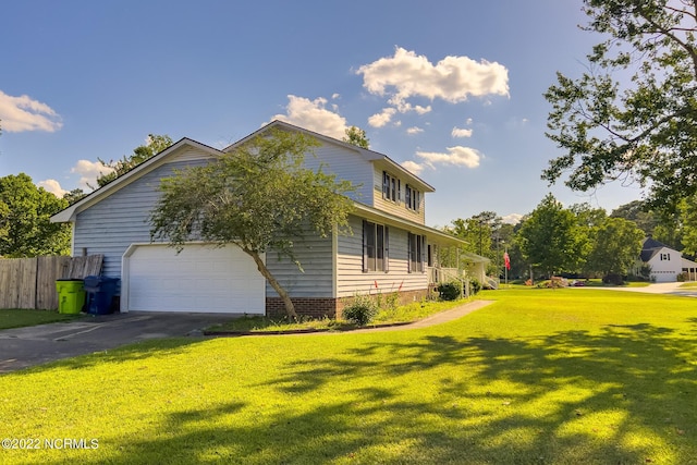 view of property exterior with a lawn and a garage