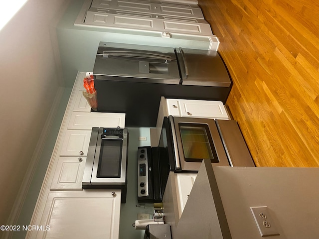 kitchen with white cabinetry