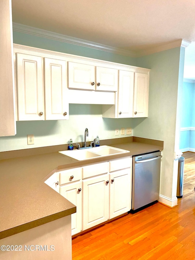 kitchen featuring dishwasher, white cabinetry, light hardwood / wood-style flooring, and sink