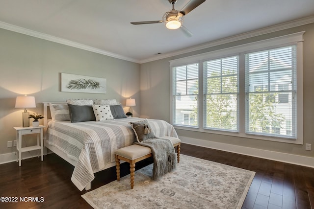 bedroom with ceiling fan, crown molding, and dark wood-type flooring