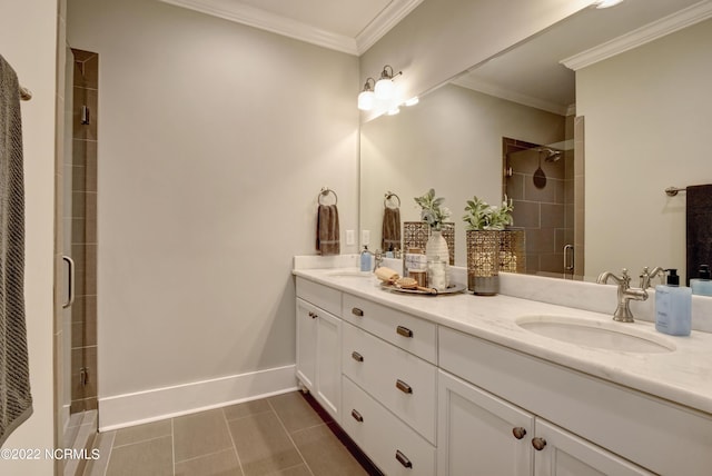 bathroom featuring large vanity, double sink, crown molding, tile flooring, and an enclosed shower