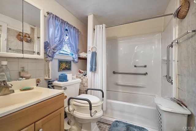 full bathroom with tile flooring, tile walls, shower / bath combination with curtain, toilet, and vanity