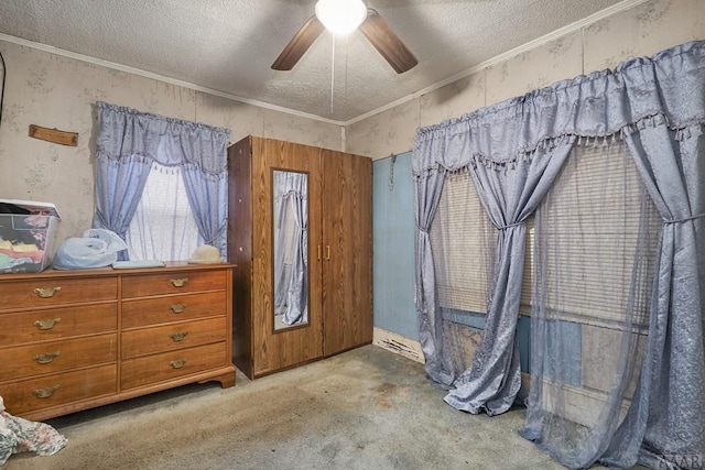 interior space featuring light carpet, a textured ceiling, ceiling fan, and ornamental molding