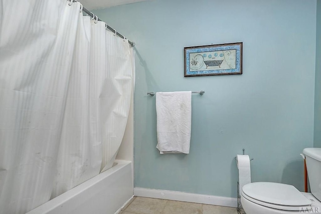 bathroom with toilet, shower / tub combo, and tile flooring