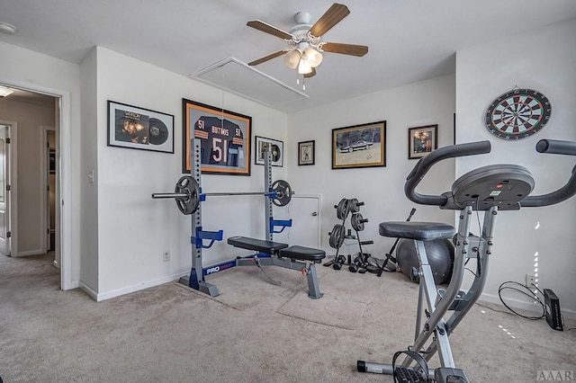 workout room featuring ceiling fan and light colored carpet