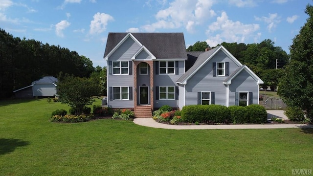 view of front of home featuring a front lawn