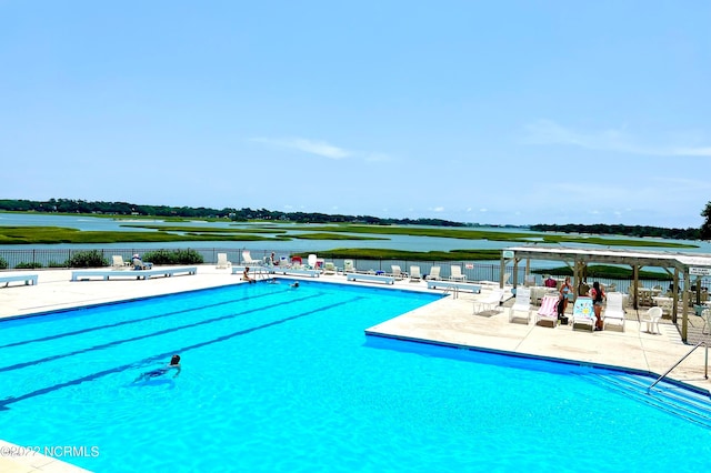 view of pool featuring a patio