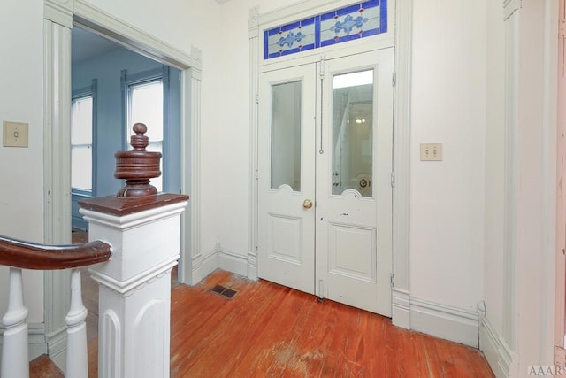 foyer entrance featuring light wood-type flooring