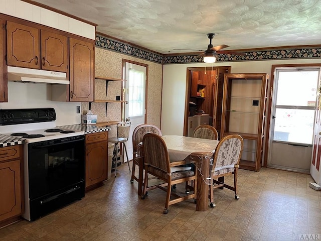 kitchen with white range with electric cooktop, tile flooring, and ceiling fan