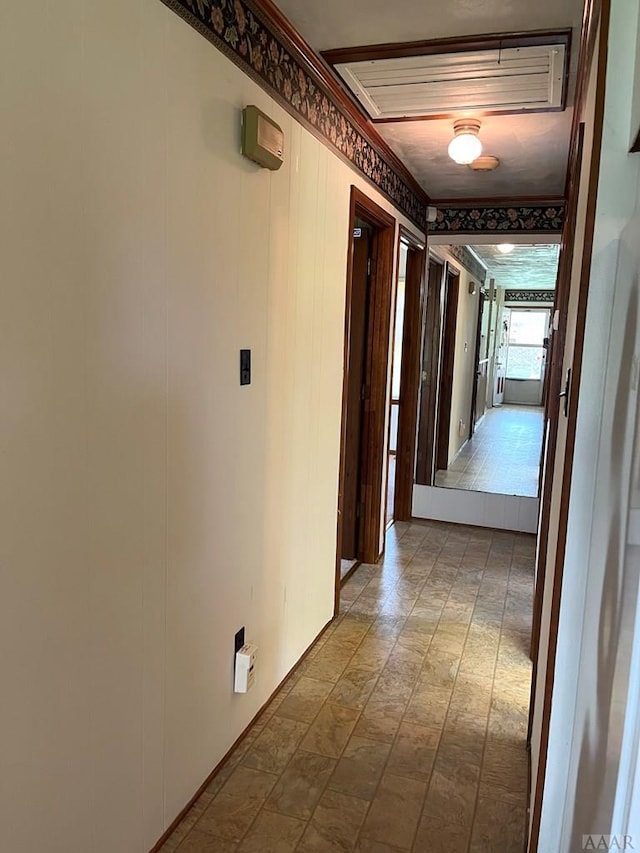 corridor featuring light tile flooring