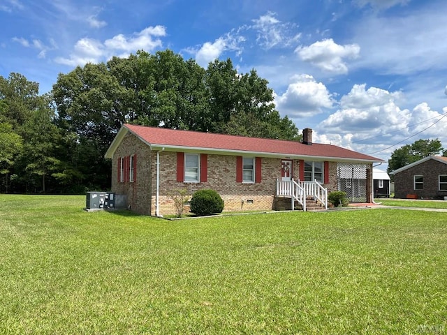 ranch-style house with a front lawn