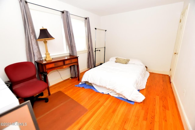 bedroom featuring light hardwood / wood-style flooring