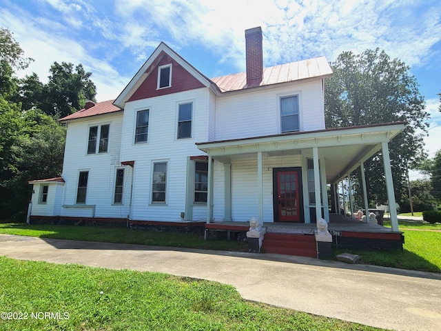 view of front of property featuring covered porch