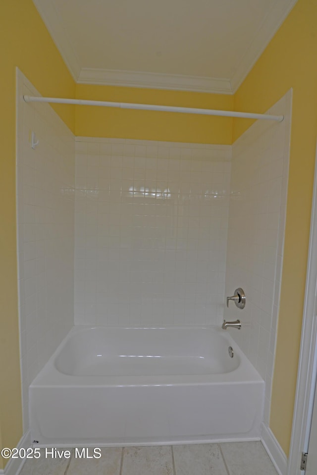 full bath with tile patterned floors, baseboards,  shower combination, and ornamental molding