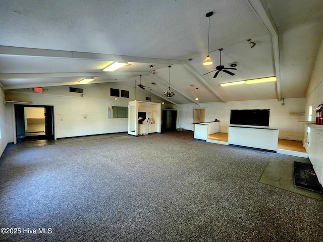 unfurnished living room featuring lofted ceiling and ceiling fan