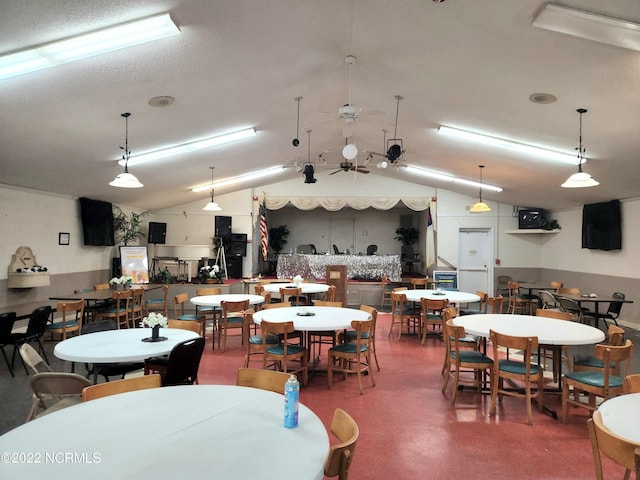 dining area with lofted ceiling and ceiling fan