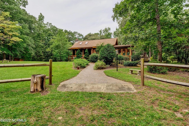 exterior space featuring a front yard