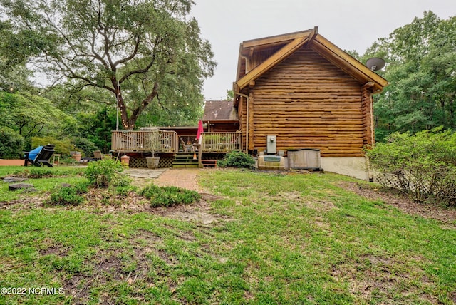 view of yard with a deck