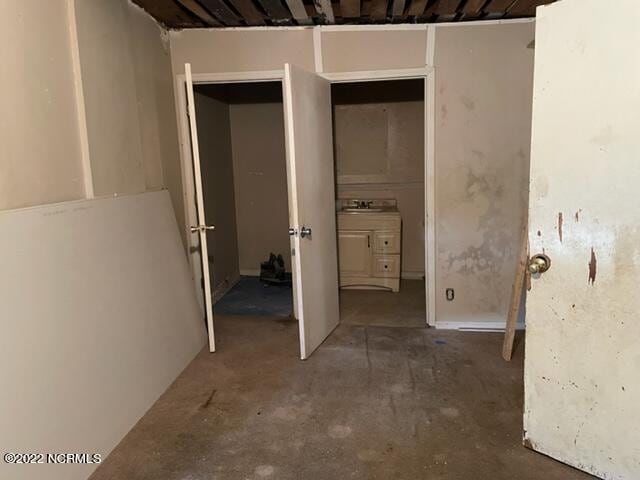 304 E Academy St, Robersonville, NC 27871 - unfurnished bedroom with sink and concrete flooring