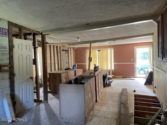 304 E Academy St, Robersonville, NC 27871 - interior space with a textured ceiling
