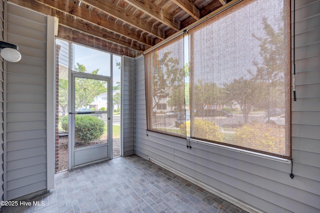 view of unfurnished sunroom