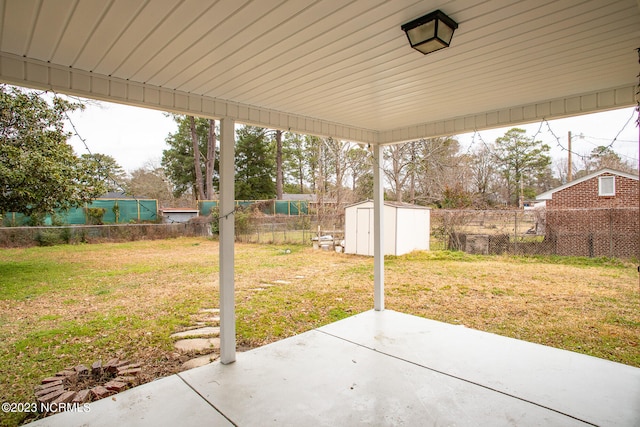 view of terrace featuring a storage shed