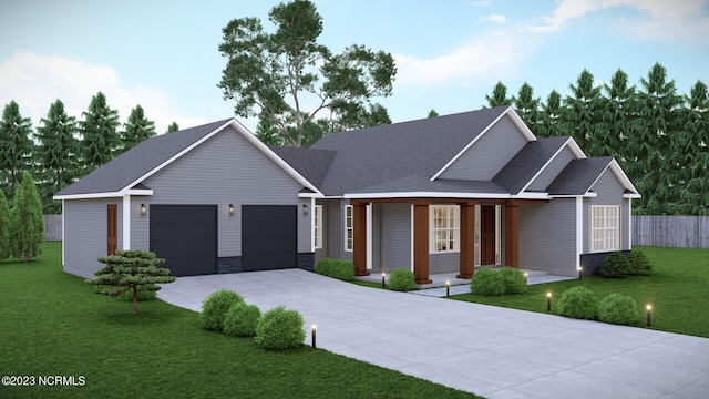 view of front of house with covered porch, a front yard, and a garage