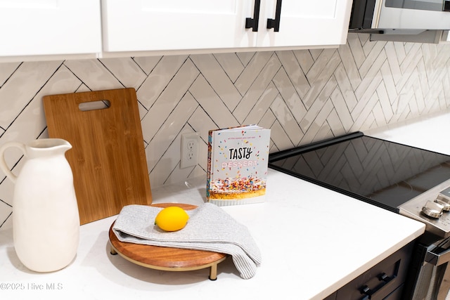 interior details featuring white cabinetry