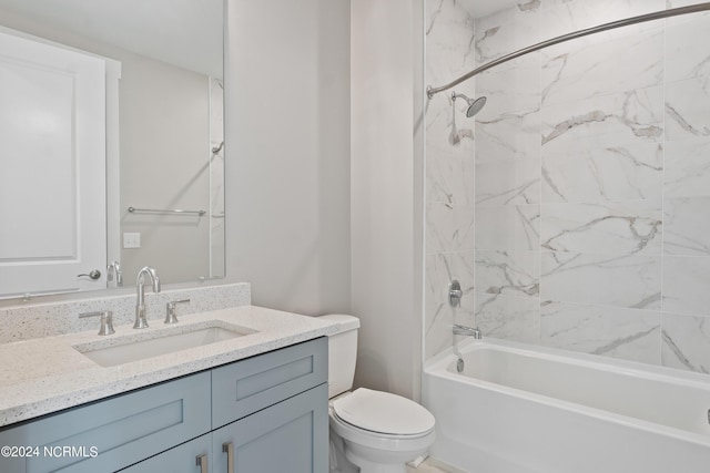 full bathroom featuring vanity, toilet, and tiled shower / bath combo