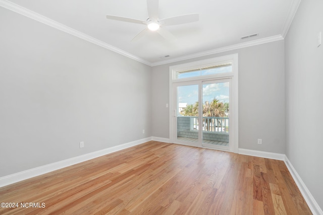 spare room with ceiling fan, crown molding, and light hardwood / wood-style floors