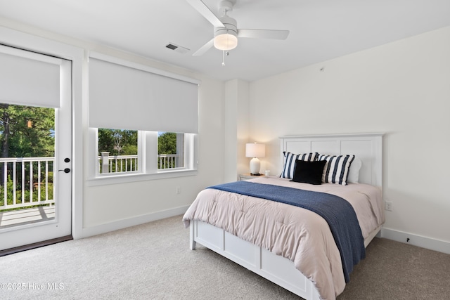 bedroom featuring ceiling fan, access to exterior, and carpet floors