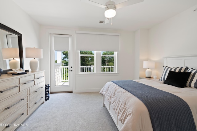 bedroom featuring ceiling fan, access to exterior, and light carpet