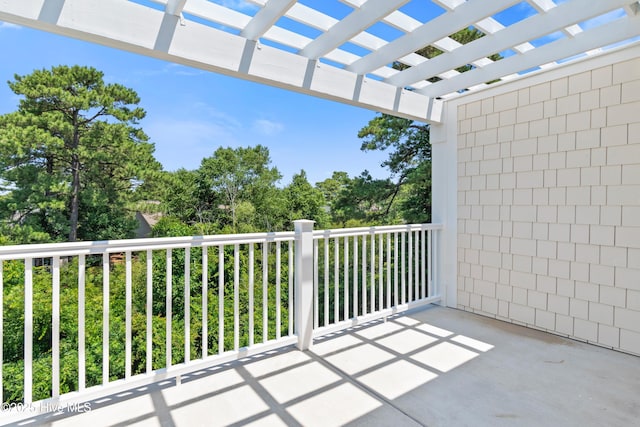 balcony featuring a pergola