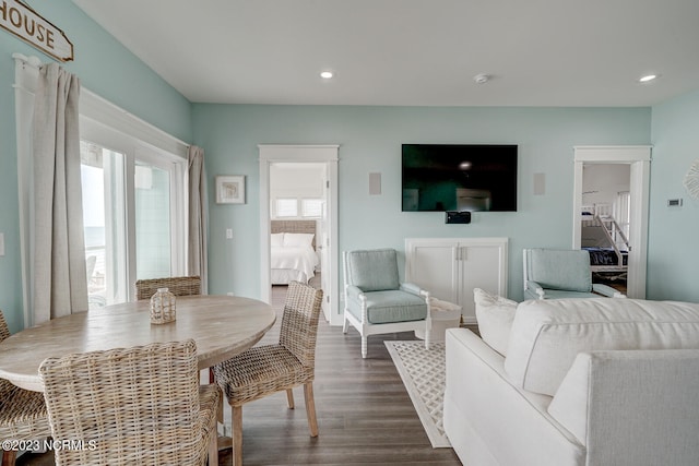 living room with dark wood-type flooring