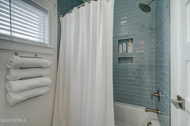 bathroom featuring shower / tub combo