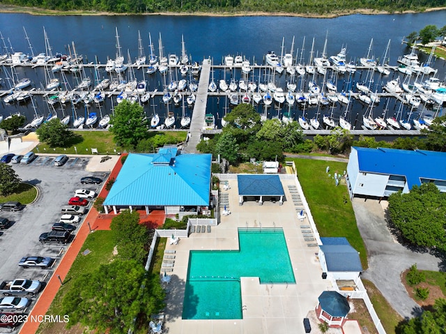 birds eye view of property featuring a water view