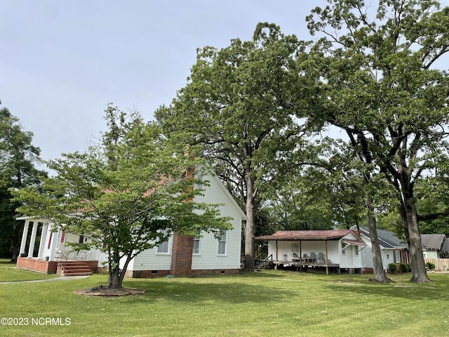 view of front of home with a front yard