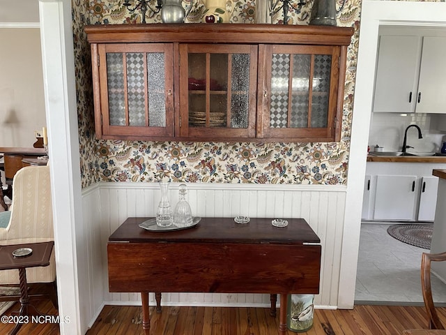 details with dark tile flooring and sink