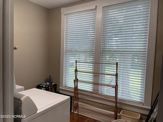 laundry area with independent washer and dryer