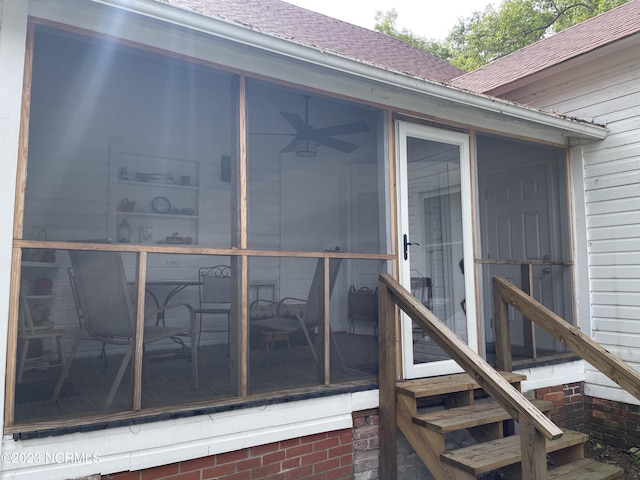 view of home's exterior featuring a sunroom