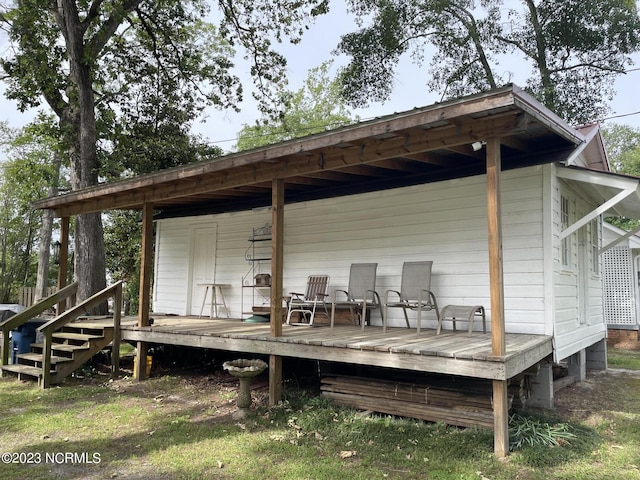 exterior space featuring a wooden deck