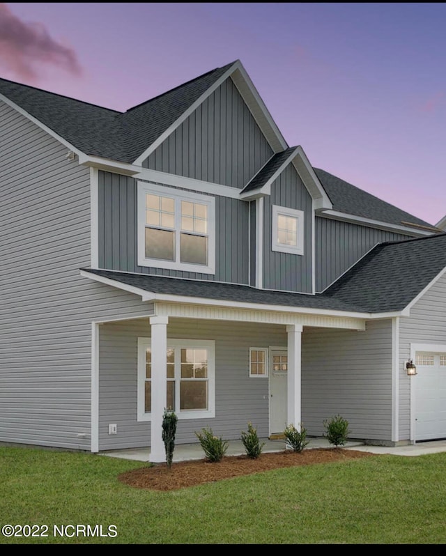 view of front of home featuring a yard